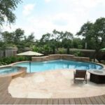 Learn why beach-style swimming pools are becoming increasingly popular. 